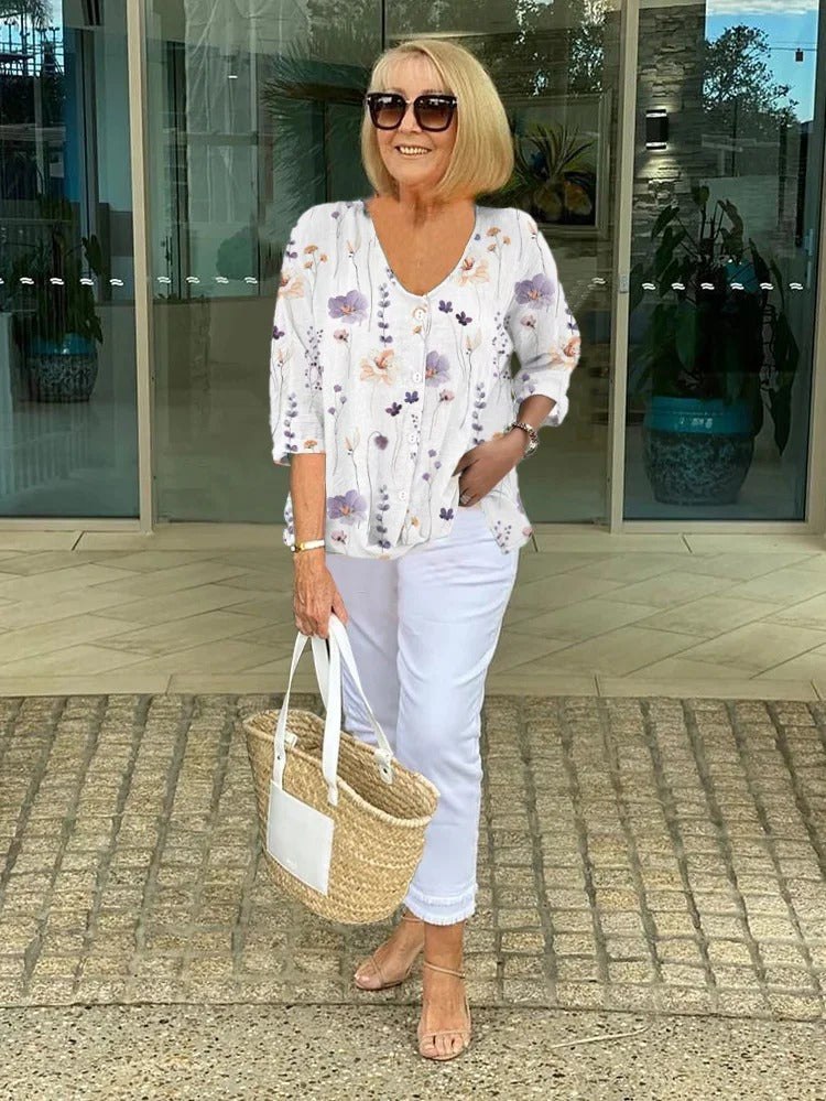 DELILAH | BLOUSE FLORALE À BOUTON STYLÉE