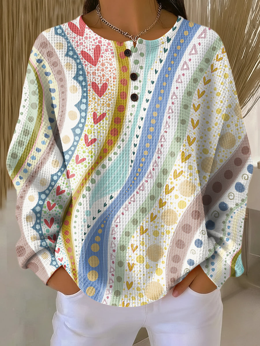 Luna | Pull avec des motifs de rayures colorées